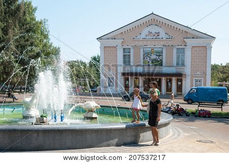 Konotop,Sumy region,Ukraine,  AUGUST  14, 2013: Town Square with theater and a fountain in the city Konotop