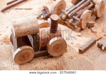 Making a homemade toy made of wood a children's locomotive train. Creativity and craft diy.
