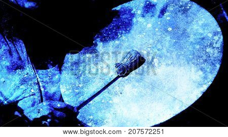 shamanic girl with frame drum on abstract structured background
