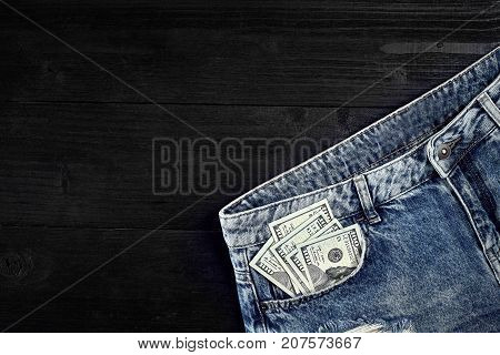 Cash in your jeans pocket. Still life. Copy space. Top view
