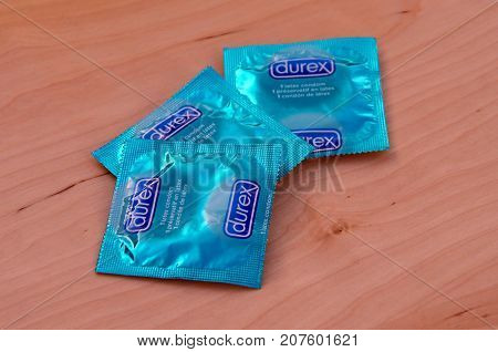 Almere, The Netherlands - October 6, 2017: Durex condoms against a wooden background.