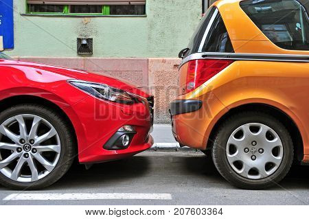 BUDAPEST HUNGARY - MAY 28: Two cars parked in the street of Budapest on May 28 2016.