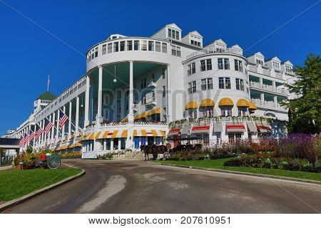 MACKINAC ISLAND, MICHIGAN - SEPTEMBER 13, 2017:  The historic Grand Hotel, built in 1887, is the premiere landmark on Mackinac Island.