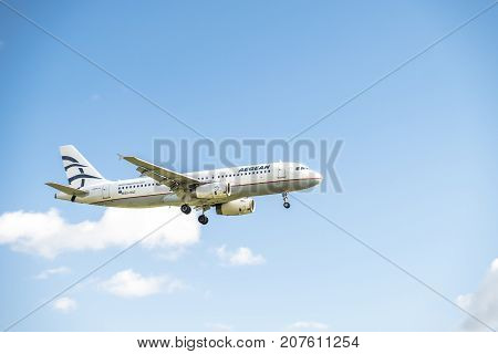 DUESSELDORF , GERMANY - OCTOBER 05 2017: Aegan Airline Airbus A320 landing at Dusseldorf Airport