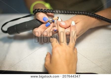 Hardware Manicure. Removal Of Old Gel Varnish In The Salon. Manicure Master Doing Beauty Procedure F