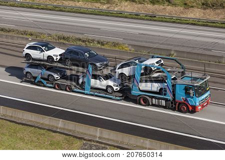 Frankfurt Germany - Sep 19 2017: Mercedes Benz Actros car transporter hauls Mercedes Benz SUVs along the A45 highway in Germany