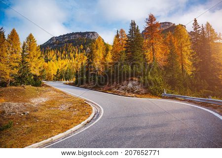 Stunning image of the alpine road. Dramatic morning scene, gloomy weather. Location famous place National Park Tre Cime di Lavaredo, Misurina, Dolomiti alps, South Tyrol, Italy, Europe. Beauty world.