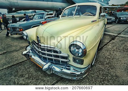 KYIV, UKRAINE - OCTOBER 2017: Soviet retro car yellow GAZ-12 (ZIM) manufactured between 1949 and 1959 is presented at the 