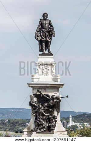 Statue of Samuel de Champlain against blue summer sky in the historic area founder of Quebec City, Canada