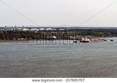 Cityscape or skyline of the Saint Lawrence river with Jean Gaulin Oil Refinery from plaines d'Abraham Quebec City Canada