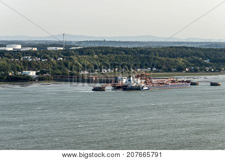 Cityscape or skyline of the Saint Lawrence river with Jean Gaulin Oil Refinery from plaines d'Abraham Quebec City Canada