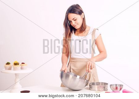 Woman Stirring Dough