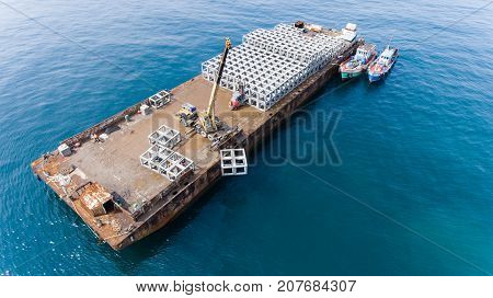 The Transport Barge Floating At The Artificial Reef Drop Zone.