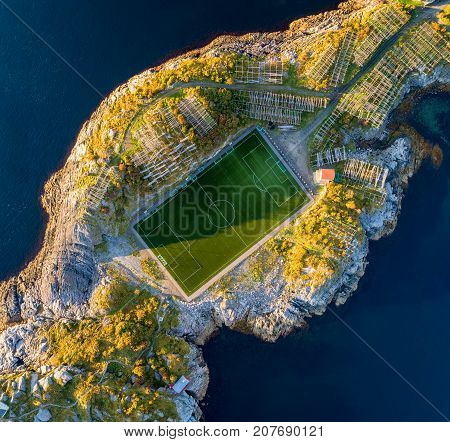 Football field in Henningsvaer from above. Henningsvaer is a fishing village located on several small islands in the Lofoten archipelago in Norway