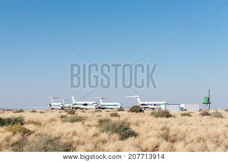 UPINGTON SOUTH AFRICA - JULY 6 2017: An aeroplane graveyard at the Upington International Airport in the Northern Cape Province