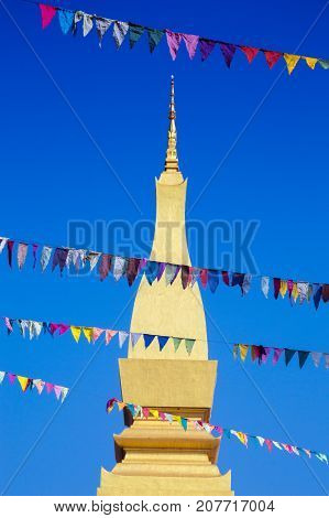 That Luang Stupa, Landmark Of Vientiane, Lao Pdr, Decorated With Colourful Pennant Banners During An