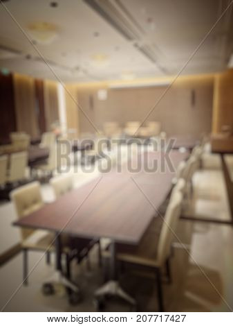 Blurred Image Of Empty Interior Of Conference Room, Meeting Room Prepare For Webinar. Blurry Nobody