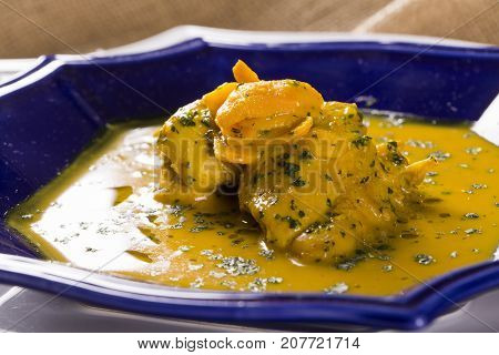 Pequi Fruit With Chicken Over A Wooden Table. Frango Com Pequi.