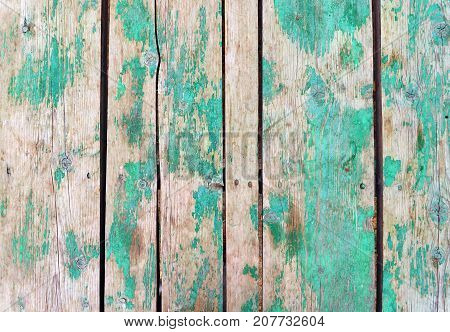 Vintage wood background with peeling paint texture