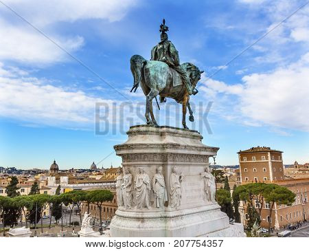 King Equestrian Statue Victor Emanuele Monument Rome Italy. Monument created in 1911 to the first king of a united Italy. Designed by Giussepe Sacconi in 1885. Vatican background.