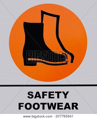 Photo of Safety Shoes Footwear sign isolated on white background. This photo was taken from the sign board.