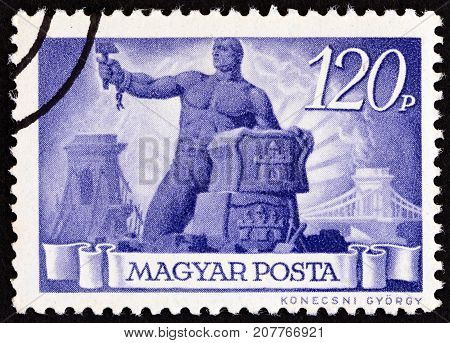 HUNGARY - CIRCA 1945: A stamp printed in Hungary shows Reconstruction, circa 1945.