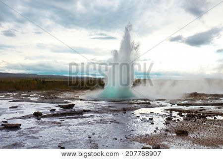 Landscape with hot spring geysir in Iceland.