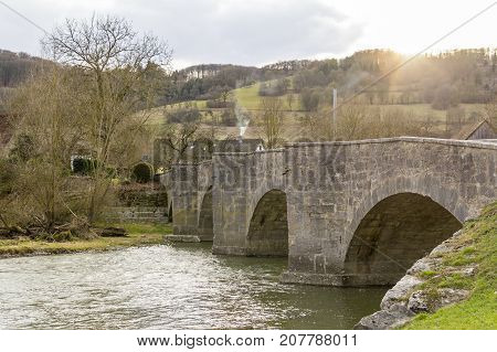 historic stone bridge at a small rural village named Oberregenbach near Langenburg in Hohenlohe a area in Southern Germany