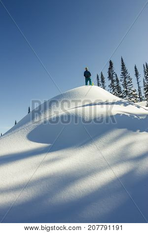 Man Skier Freerider Standing At Top Of Ridge, Adventure Winter Freeride Extreme Sport