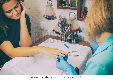 for a girl doing a manicure at the spa.