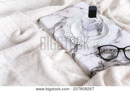 Perfumery On Wooden Stand And Glasses