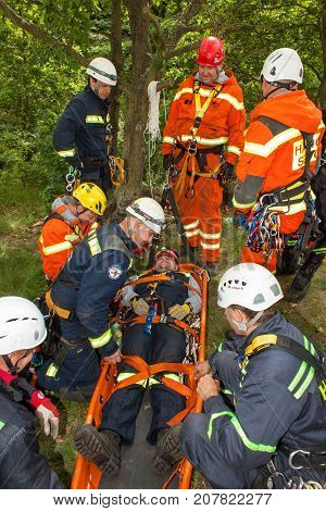 Kadan Czech Republic June 6 2012: Exercise rescue units. Training rescue people in inaccessible terrain at the dam Kadan. Recovery using rope techniques