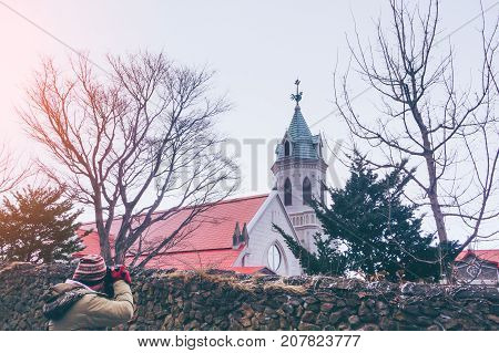 Traveler take a photo Hakodate Orthodox Church with snow at winter season at Hakodate Hokkaido Japan
