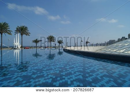 EGYPT ALEXANDRIA:- SEPTEMBER 19 2010: Pool near the building of the Bibliotheca Alexandrina. The Bibliotheca Alexandrina (Library of Alexandria) is a major library and cultural center located on the shore of the Mediterranean Sea in the Egyptian city of A
