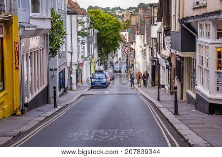 Totnes Devon England 21 July 2017: View of the central street of Totnes. Street under a big bias. UK