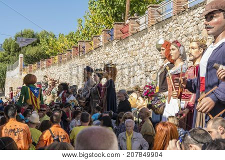 Alcover, Spain, October 2017:Giants and large heads are a folkloric tradition of catalonia and parts of Spain.They've a papier mach head and bodies are covered in clothing matching the costume's theme