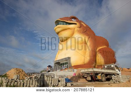 YASOTHON THAILAND - JULY 9 : construction of toad museum at Phaya Thaen Public Park on July 9 2017 in Yasothon Thailand. Wide shot.
