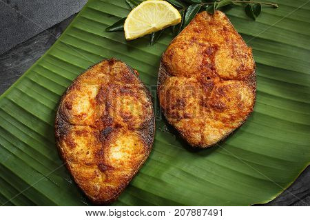 King Fish fry on banana leaf selective focus