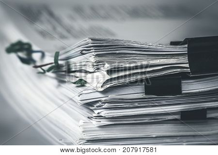 extreamly close up  stacking of office working document with paper clip folder, vintage color tone
