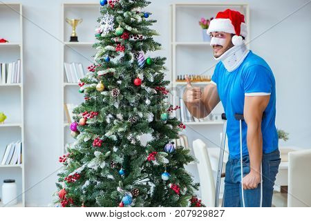 Injured man celebrating christmas at home