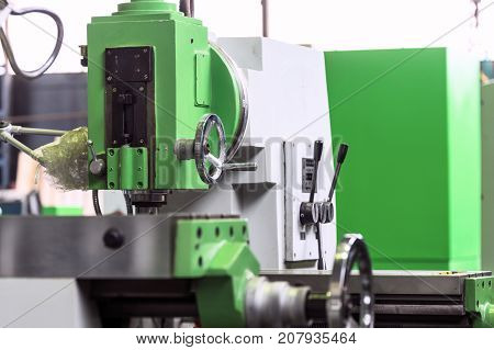 Working table of a new vertical milling machine. Plant for the production of machine tools.
