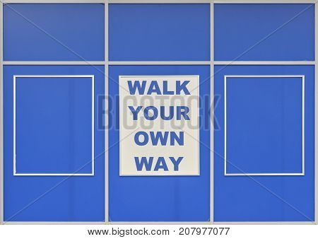 Text Walk Your Own Way written on blue background