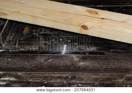 Board On A Table Of Circular Saw