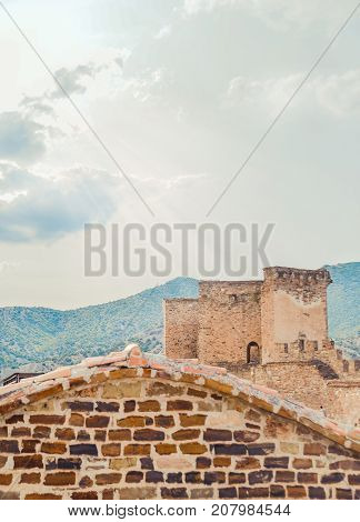 Genoese fortress in Sudak, the Crimea Peninsula, Black sea. Consular castle and the fortification wall of the upper tier. Part of the wall, Museum-reserve 