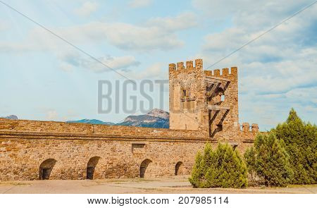 Genoese fortress in Sudak, the Crimea Peninsula, Black sea. Consular castle and the fortification wall of the upper tier. Part of the wall, Museum-reserve 