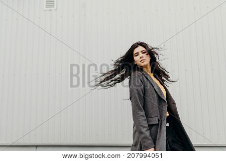 Portrait Of Stylish Modern Young Curly Woman