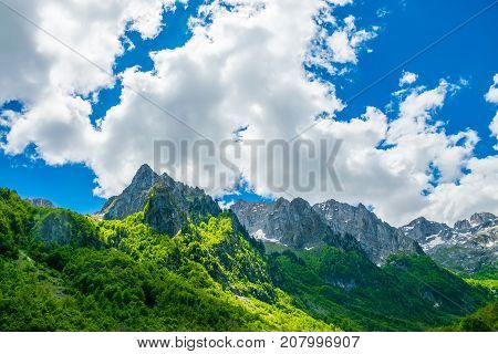 Picturesque Snow-capped Peaks Of High Mountains.