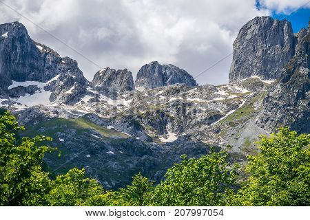 Picturesque Snow-capped Peaks Of High Mountains.