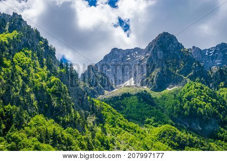Picturesque Snow-capped Peaks Of High Mountains.