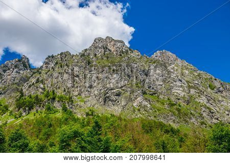 Picturesque Snow-capped Peaks Of High Mountains.
